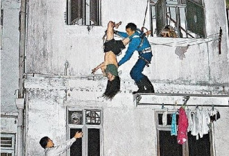 香港同居情侣吵架 少女跳楼不死倒挂半空