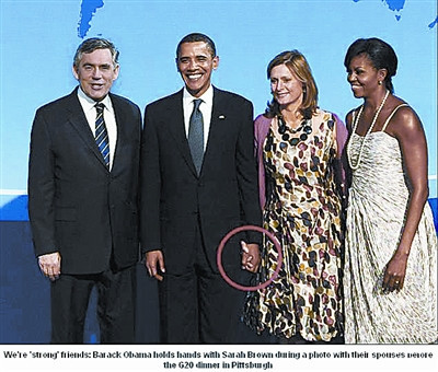 奥巴马夫妇3张尴尬照片成媒体爆炒焦点(组图)