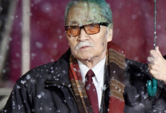 葛存壮葛优父子同场亮相 冒雪走红毯