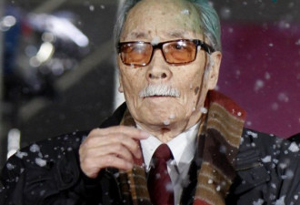 葛存壮葛优父子同场亮相 冒雪走红毯