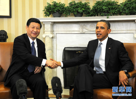 2月14日，中国国家副主席习近平在华盛顿白宫会见美国总统奥巴马。新华社记者 兰红光 摄 