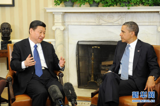 2月14日，中国国家副主席习近平在华盛顿白宫会见美国总统奥巴马。新华社记者 兰红光 摄 