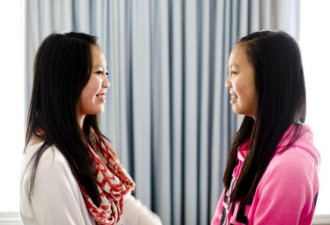中国双胞胎被分别收养 居然加拿大团聚