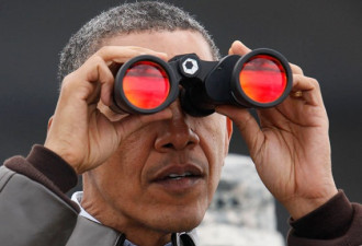 奥巴马到访三八线 用望远镜眺望朝鲜