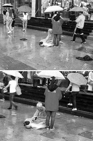 女孩上班时为乞讨老人撑伞挡雨 因不好好工作被开除(图)