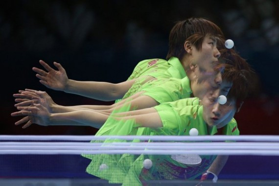 this-in-camera-multiple-exposure-shot-shows-chinas-ning-ding-and-the-table-tennis-ball-at-various-stages-of-a-shot-during-the-womens-gold-medal-match