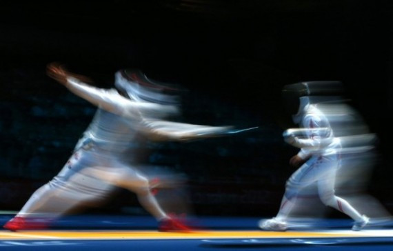 this-multiple-exposure-of-two-olympic-fencers-gives-a-sense-of-rapid-movement-unlike-the-others-where-the-athlete-seem-to-be-captured-at-different-moments