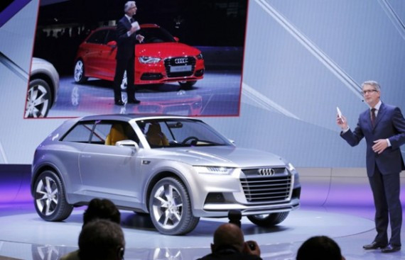 Audi Chief Executive Officer Rupert Stadler stands next to an Audi Q2 car while addressing reporters on media day at the Paris Mondial de l'Automobile  day at the Paris Mondial de l'Automobile