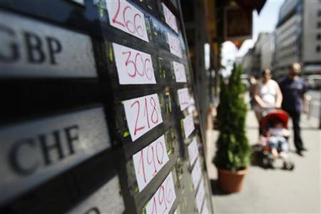 Foreign currency exchange rates are displayed at a shop in Budapest