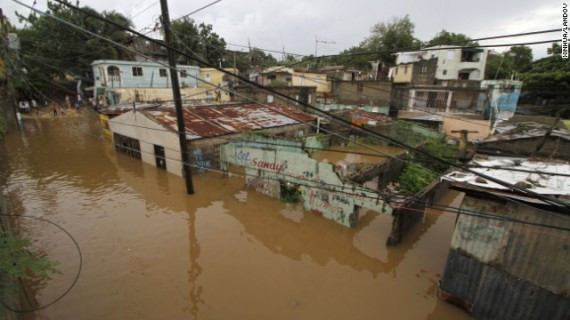 Houses are flooded in the neighborhood of La Javilla in Santo Domingo, the capital of Dominican Republic, on Friday.