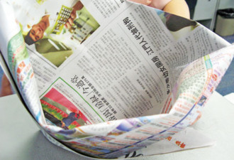 厨余垃圾堆肥易腐败 报纸折袋可防臭
