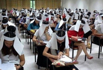 泰国考生戴“防作弊帽” 网友嘲笑：像奔丧