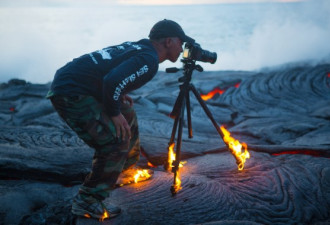 摄影师冒险近离拍摄 火山岩浆入海照