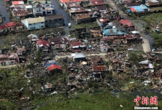 台风袭击菲律宾 从父手中卷走3名女儿