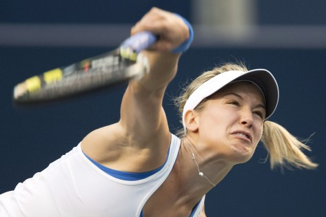 Canada's Eugenie Bouchard serves during her Rogers Cup women's match against Russia's Alisa Kleybanova, Aug. 6, 2013. THE CANADIAN PRESS/Frank Gunn