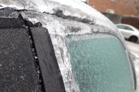 A car is shown coated in ice after a freezing rainstorm in Brampton on Dec. 22, 2013. CITYNEWS/Tony Fera