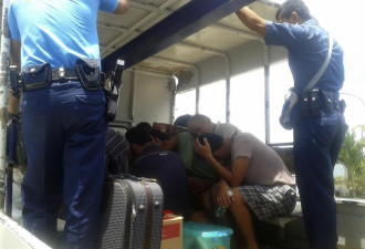 菲律宾官方公布被扣11名中国渔民照片