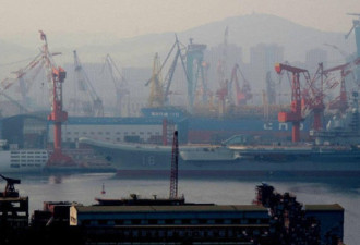 中国航母消失两月后亮相港口 焕然一新