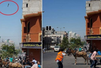 记者抓拍 以军炸弹命中加沙街区瞬间