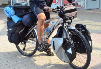 单骑环游世界 自行车骑士汤凯宇抵多市