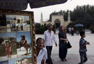 当维吾尔女性面纱遭中国民族同化政策