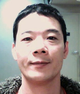 在加拿大邊境服務署通緝名單上的中國男子楊頂金(Yang Ding Jing,音譯)。(CBSA提供)