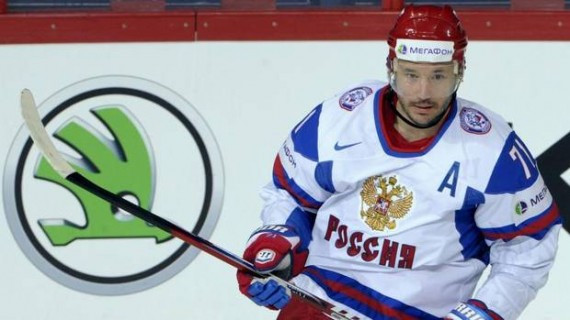 In this May 13, 2013 file photo, Russia's Ilya Kovalchuk celebrates his goal during the 2013 Ice Hockey World Championships match against Austria in Helsinki. Kovalchuk left the New Jersey Devils and retired from the NHL, leaving $77 million on the table last summer to go back home and play in Russia. (Jussi Nukari/AP)