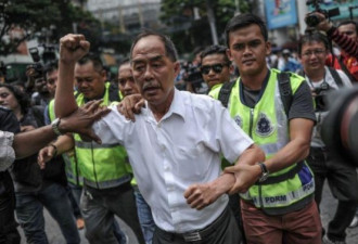 马来西亚骚乱街头出现“血洗华人”传单