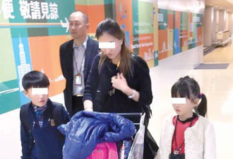 中国女携儿带女 持加国假签证闯关出国
