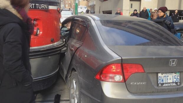 close up streetcar vs vehicle
