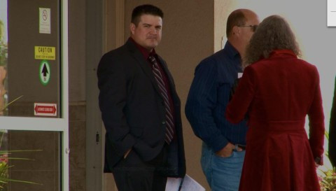 Constable Eric Shorey walks out of Police Services Act Hearing at Fairfield Inn and Suites in Belleville on Thursday October 8, 2015. (Photo: Tom Harris)