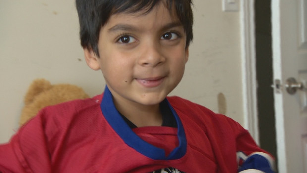 Syed Adam Ahmed, 6, has trouble travelling because his name appears on the Deemed High Profile list, his parents say.