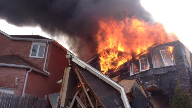 Five people were hospitalized after a massive fire tore through a Markham home on Tuesday afternoon.