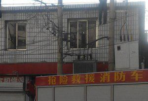 北京电线杆上挂男尸 警方: 吊腰带自杀