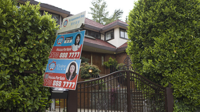 May 3, 2016 - Vancouver, B.C. - House for sale signs with Mandarin or Cantonese. Photo by Jimmy Jeong