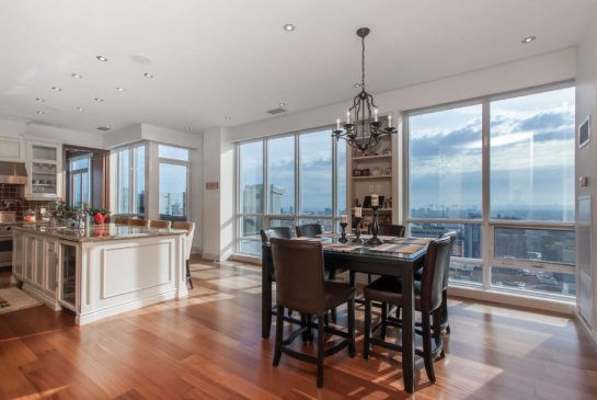 The 5,000 square foot condo features 10-ft. ceilings and panoramic views of Toronto.