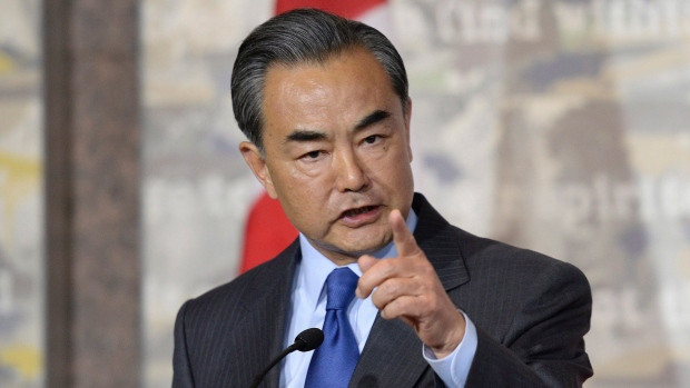 China's Minister of Foreign Affairs Wang Yi scolds a Canadian journalist during a press conference with Canadian Minister of Foreign Affairs Stephane Dion.