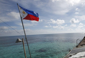 中国军方回应是否会拖走仁爱礁菲律宾破船
