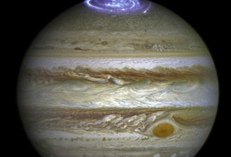 哈勃拍下木星北极绚丽极光:面积可与地球媲美