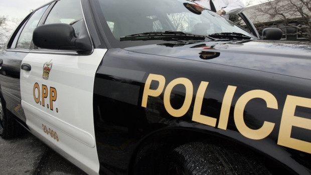 Ontario Provincial Police said men were arrested after 30 boxes containing more than 300,000 contraband cigarettes were found in a vehicle north of Toronto.