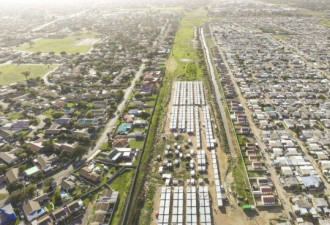 美国摄影师航拍图展示南非贫富差距 天渊之别