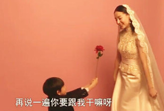 董洁再披婚纱明艳动人 儿子顶顶献花