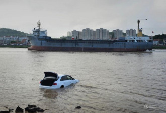 宁波一女子驾奥迪车飞越30余米坠入江中
