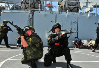 俄媒:中国拉俄罗斯蹚浑水 南海军演苦不堪言