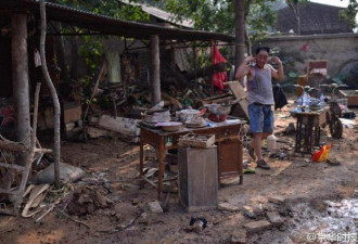 邢台大贤村洪灾后：村民回到满是淤泥的家