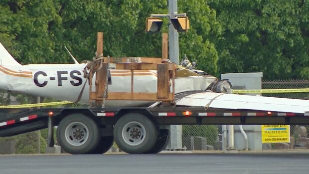 Police say a man flying this plane died when the plane crashed on a roadway south of downtown Peterborough, Ont., after 1 a.m. ET Friday. They also say the plane had been stolen.