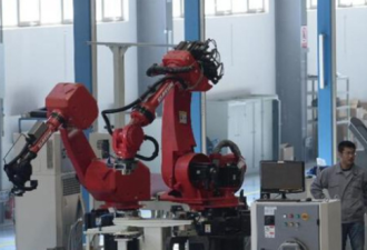 外媒看广东产业升级：机器换人 厂房不需开灯