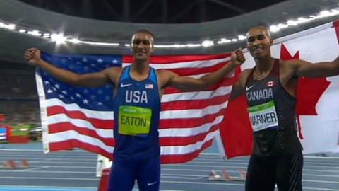 USA's Eaton and Canada's Warner enjoy the moment after men's decathlon 1500m
