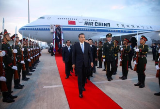 老挝铺开红地毯盛情迎接中国总理李克强
