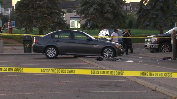 A damaged bicycle is seen on the ground in a McDonald's parking lot in Oakville after a cyclist was struck and seriously injured on Wednesday, Sept. 14, 2016.